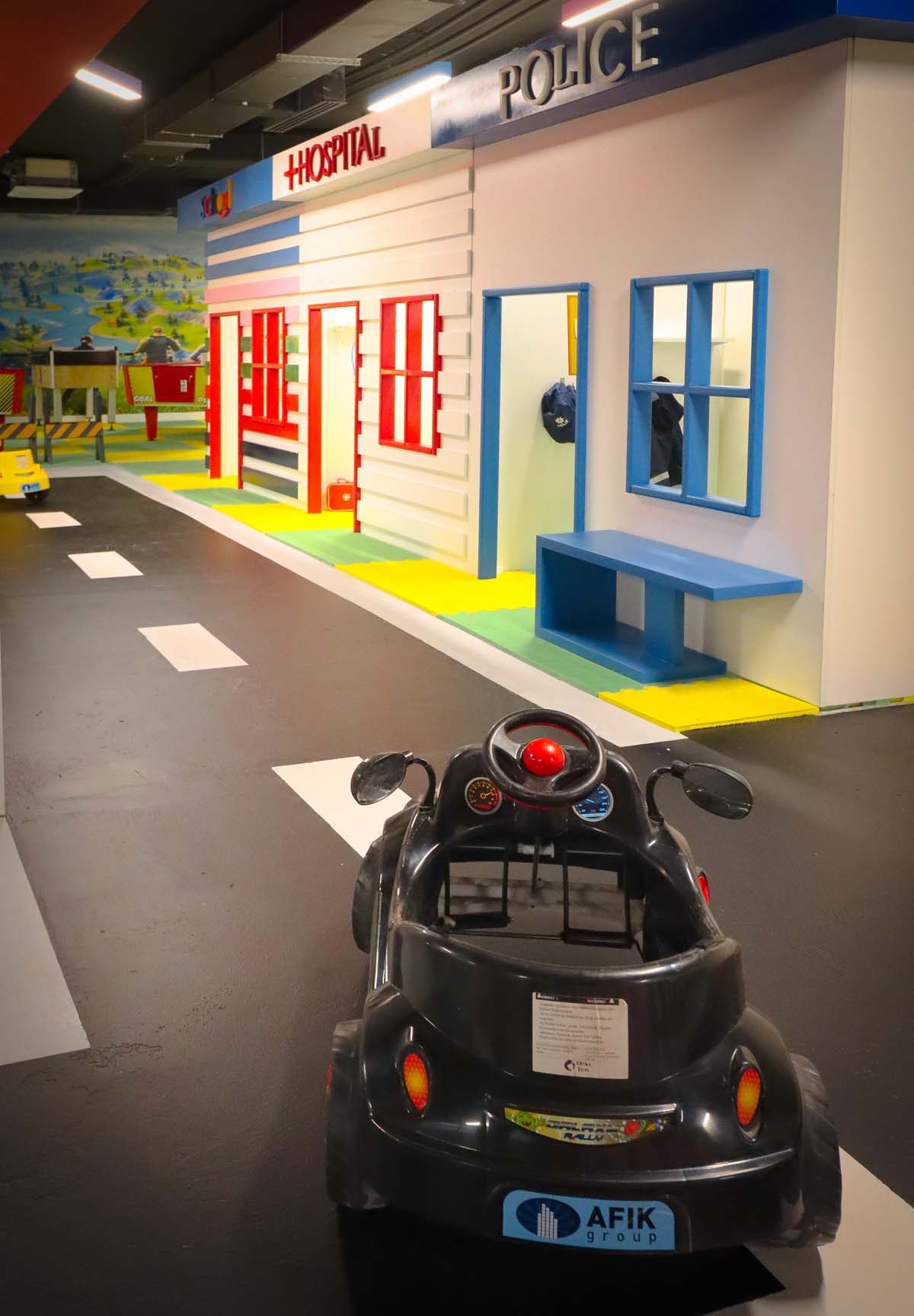 Kids' room with a play road and toy car