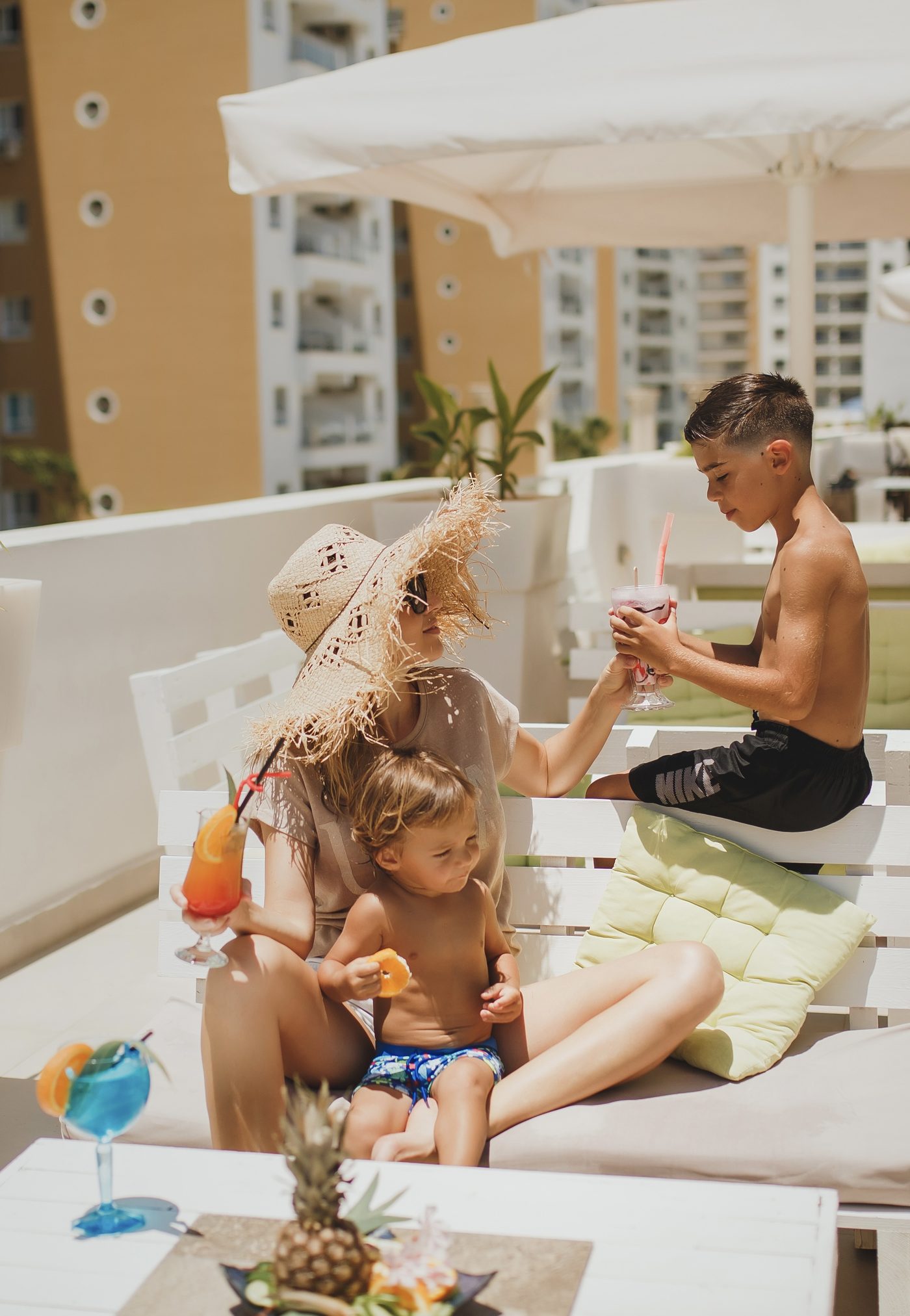 A family relaxing on a terrace at a Caesar resort